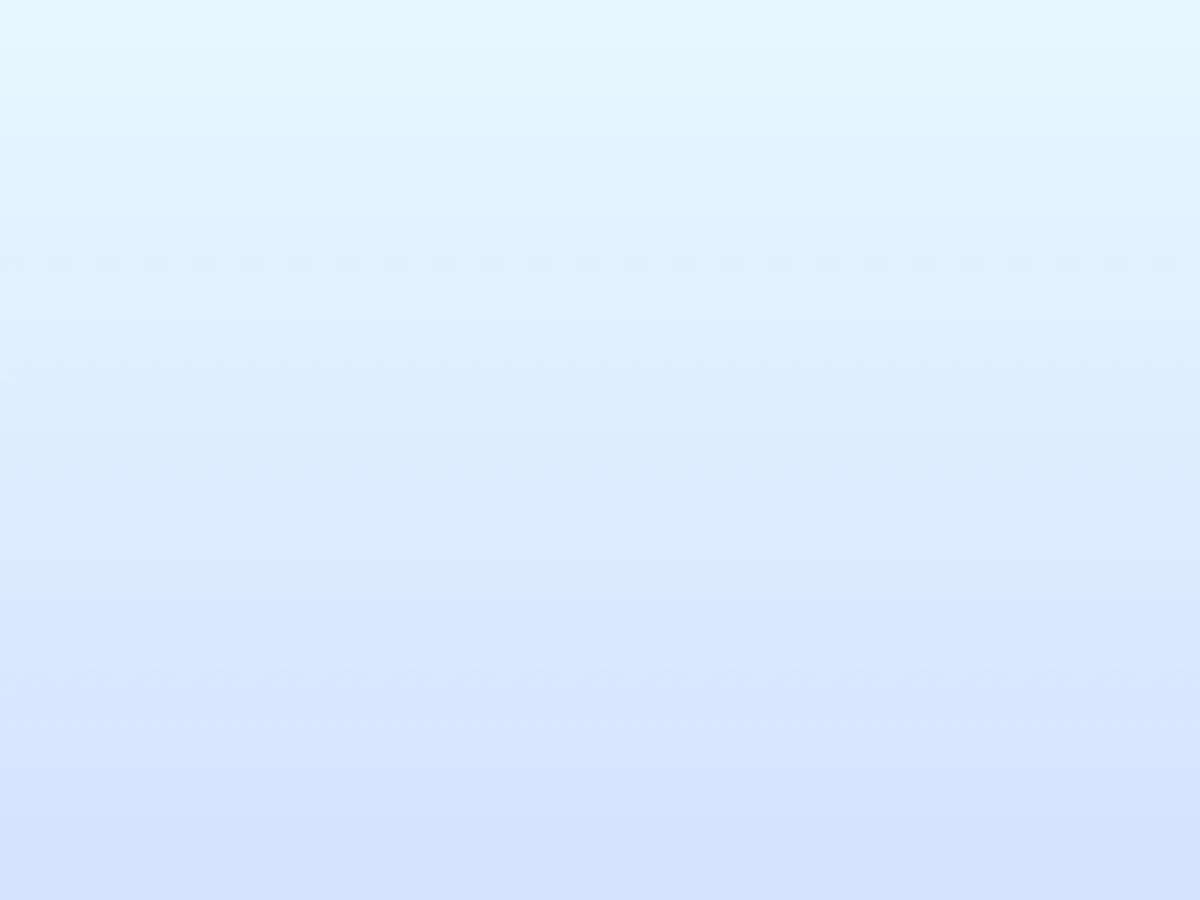 Cheerful shop owner working on a laptop in a cafe environment